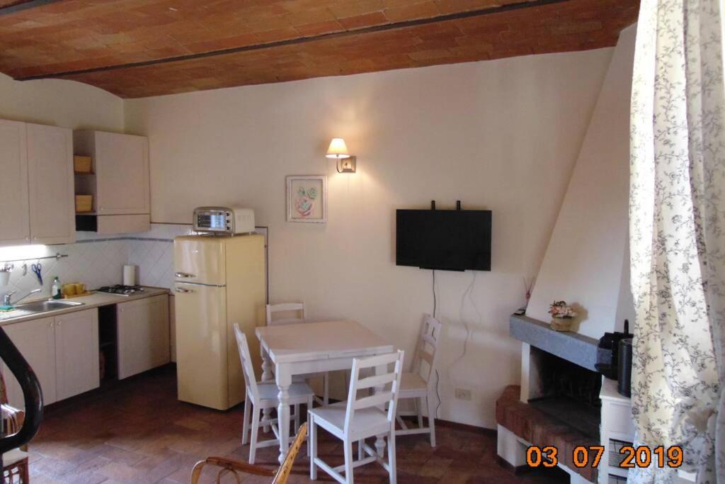 Kuchyňa alebo kuchynka v ubytovaní Appartamento I Pini