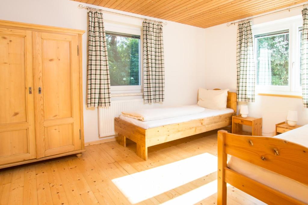 Postel nebo postele na pokoji v ubytování Familienferienhof Stabauer