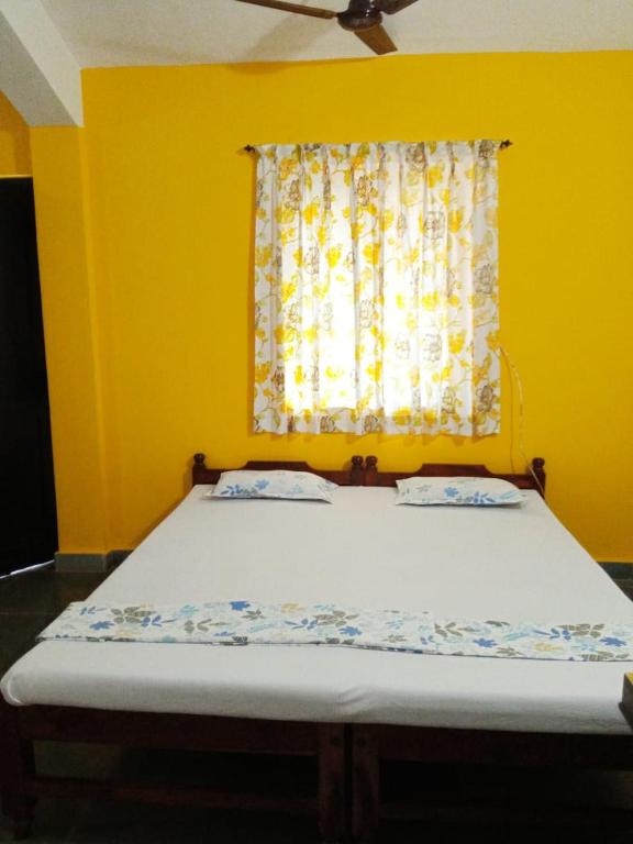 Postel nebo postele na pokoji v ubytování Shalom Guest House