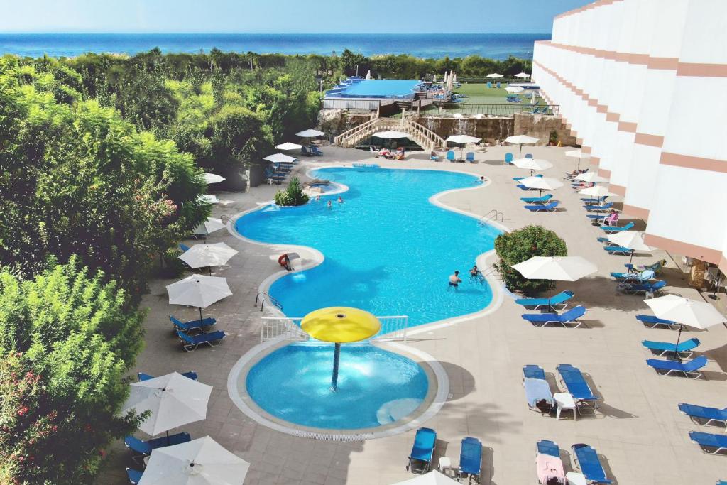 an overhead view of a swimming pool at a resort at Avlida Hotel in Paphos City