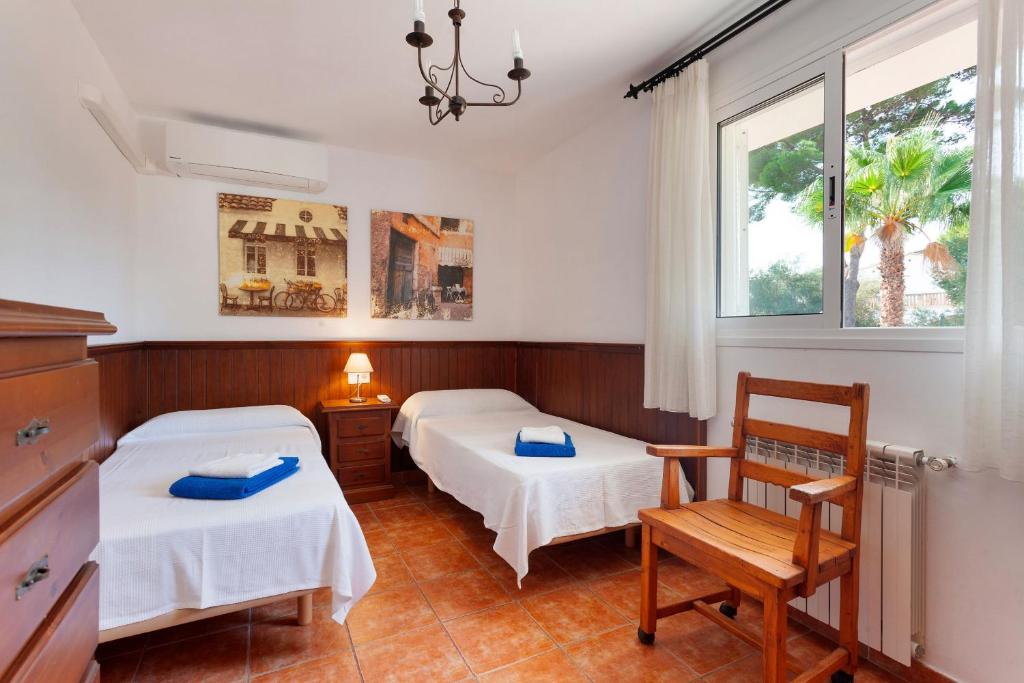 A bed or beds in a room at Can Minu