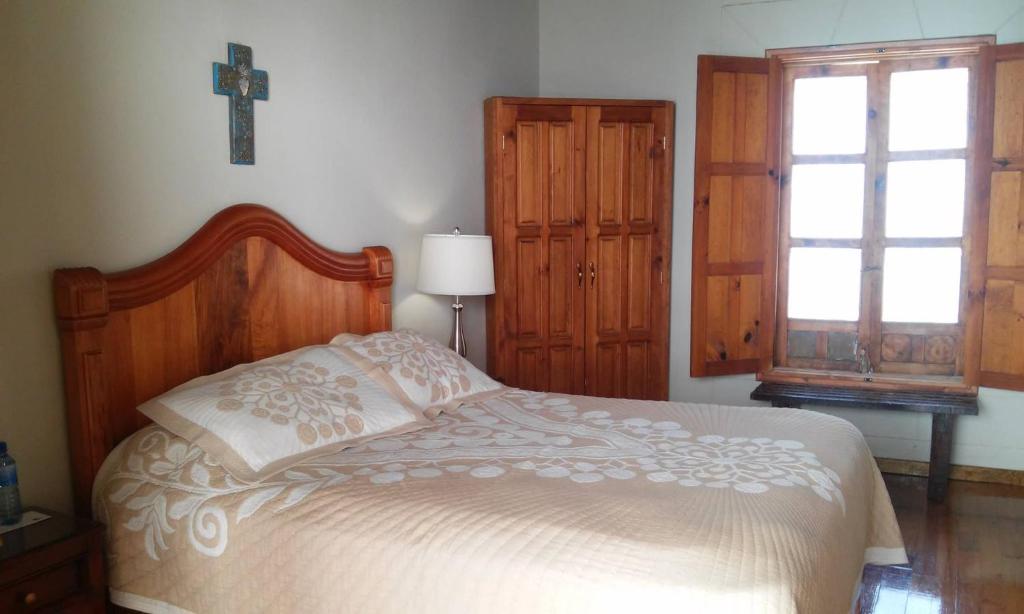 Postel nebo postele na pokoji v ubytování Hotel Santa Clara