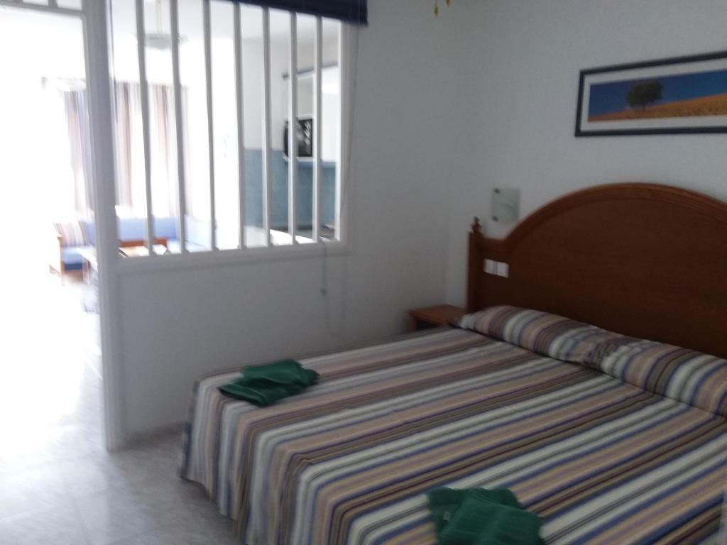 Postel nebo postele na pokoji v ubytování Jandia Attico Vista Oceano