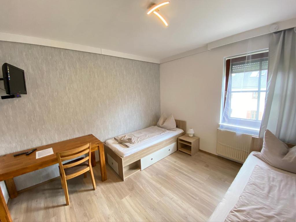 Postel nebo postele na pokoji v ubytování Pension Günther