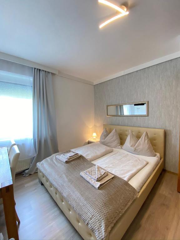 Postel nebo postele na pokoji v ubytování Pension Günther