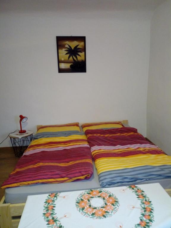 Postel nebo postele na pokoji v ubytování Ubytovanie u Tomku
