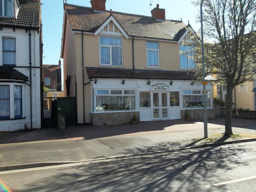 a building on the side of a street at Chantry Villa Hotel in Skegness