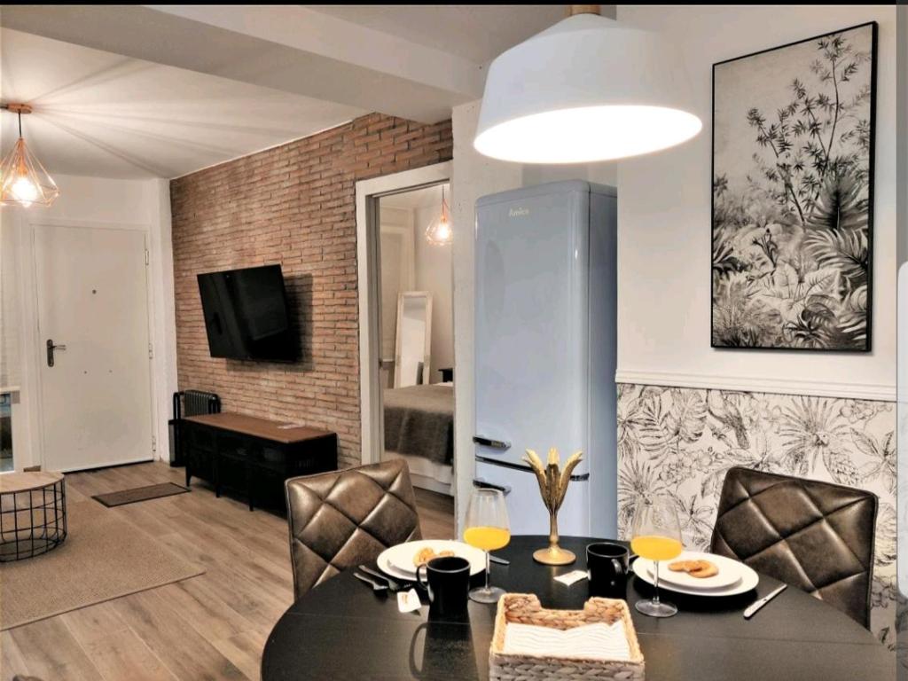 TV a/nebo společenská místnost v ubytování Suite Haus Vargas