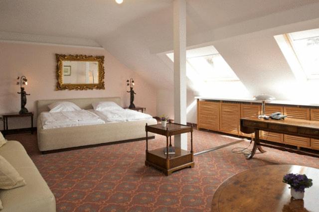 Postel nebo postele na pokoji v ubytování Hotel Behrmann