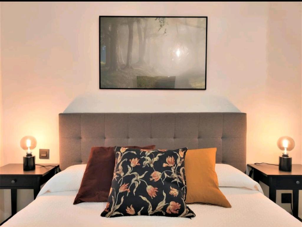 Postel nebo postele na pokoji v ubytování Suite Haus Vargas