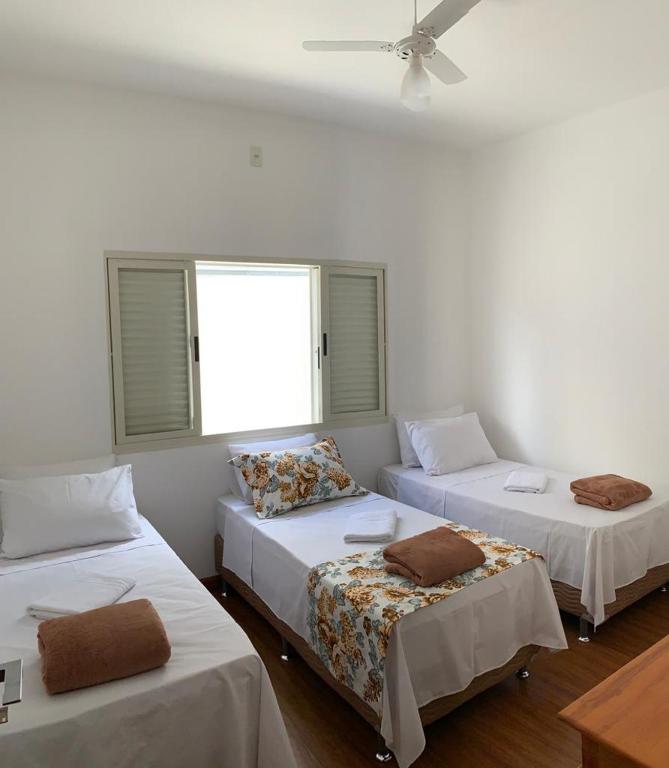 Postel nebo postele na pokoji v ubytování Casa Recanto da Paz