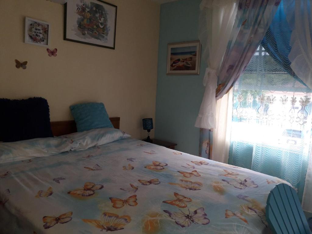 Postel nebo postele na pokoji v ubytování Seacastle Deluxe Studio
