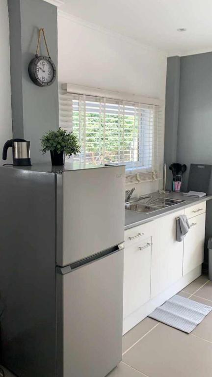 Kuchyň nebo kuchyňský kout v ubytování Apartment Curacao