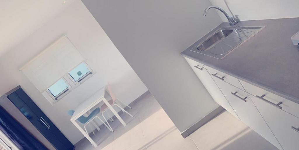 Kuchyň nebo kuchyňský kout v ubytování Apartment Curacao