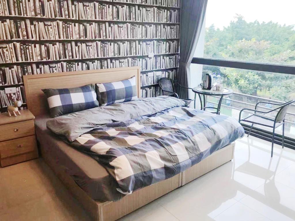 Giường trong phòng chung tại Zhong Xing Lohas Homestay