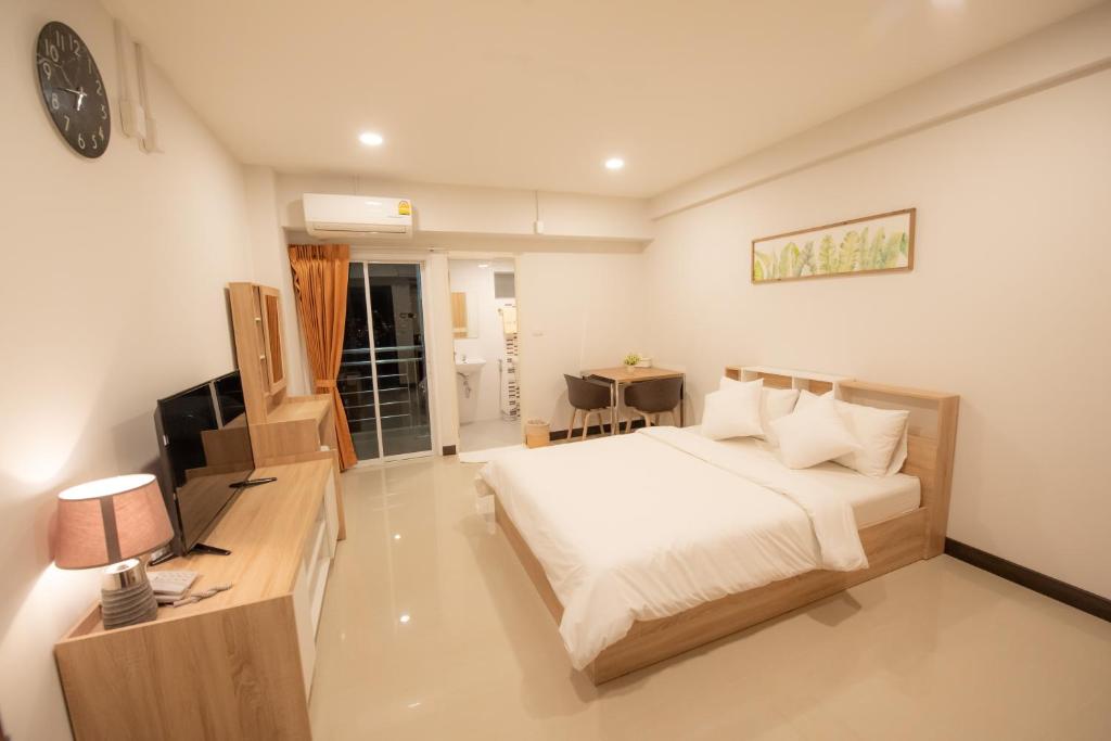 Postel nebo postele na pokoji v ubytování U Sabai Hotel Bangkok