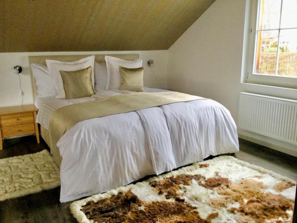 En eller flere senge i et værelse på Gästehaus Casa Cecilia