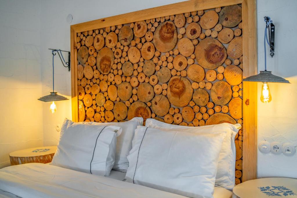 Postel nebo postele na pokoji v ubytování Yonca Lodge