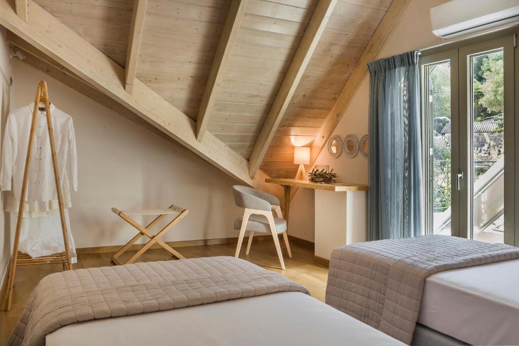 Posteľ alebo postele v izbe v ubytovaní Grand View Maisonette