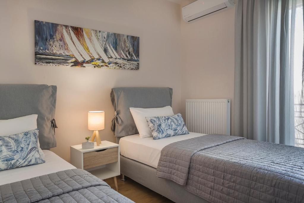 Posteľ alebo postele v izbe v ubytovaní Grand View Maisonette