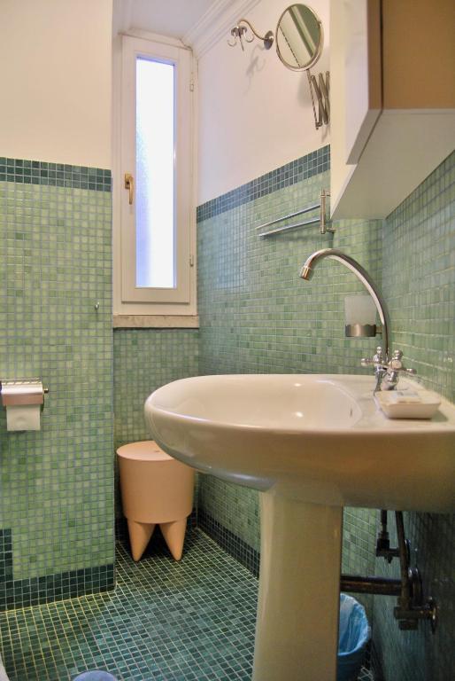 Kúpeľňa v ubytovaní Navona Residenza de Charme
