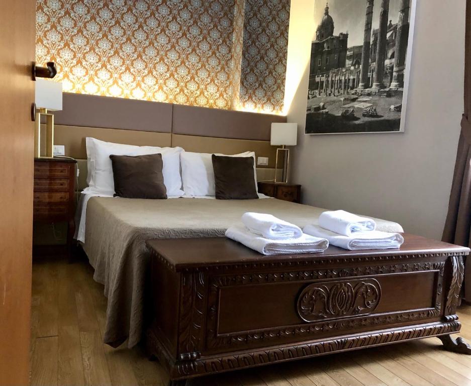 Posteľ alebo postele v izbe v ubytovaní Navona Residenza de Charme