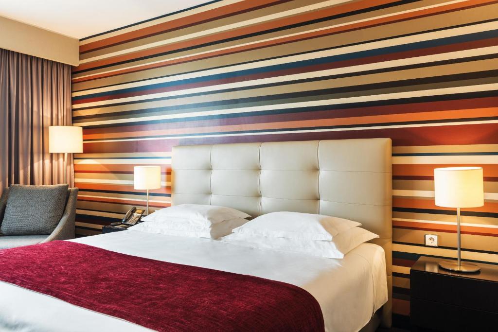 Voodi või voodid majutusasutuse Hotel Trópico toas