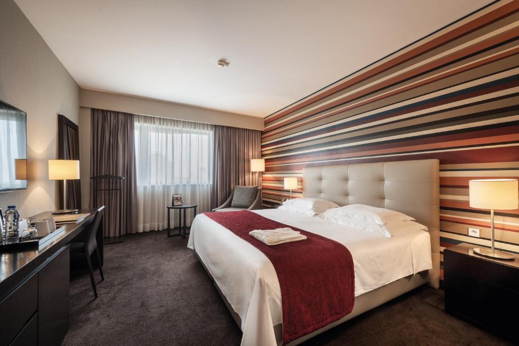Voodi või voodid majutusasutuse Hotel Trópico toas