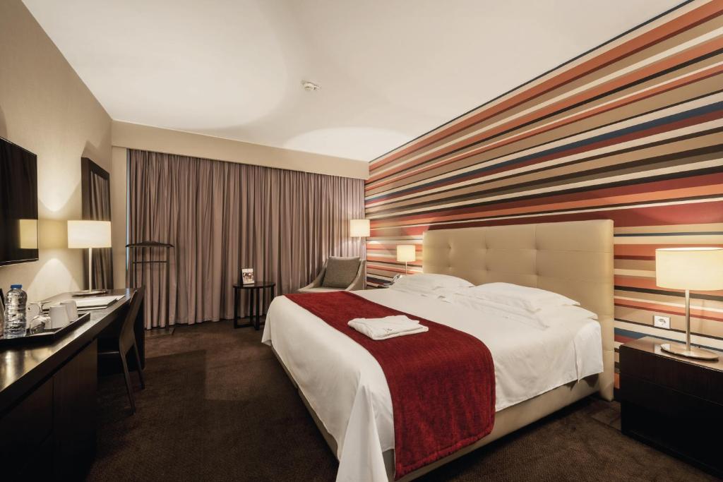 Voodi või voodid majutusasutuse Hotel Trópico toas