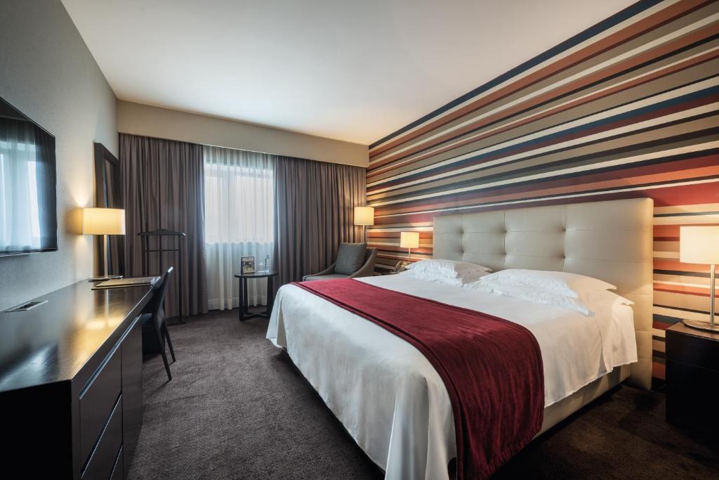 Voodi või voodid majutusasutuse Hotel Trópico toas