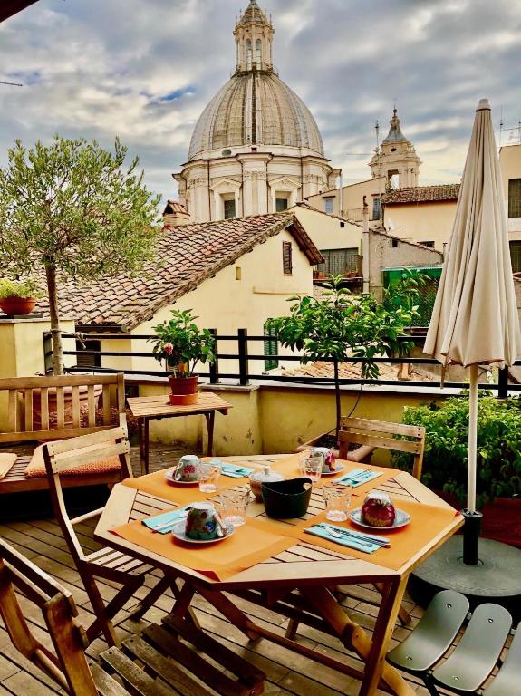 Reštaurácia alebo iné gastronomické zariadenie v ubytovaní Navona Residenza de Charme