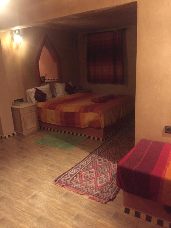 Postel nebo postele na pokoji v ubytování Auberge Le Festival Todra Gorge