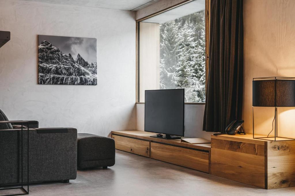TV a/nebo společenská místnost v ubytování rocksresort