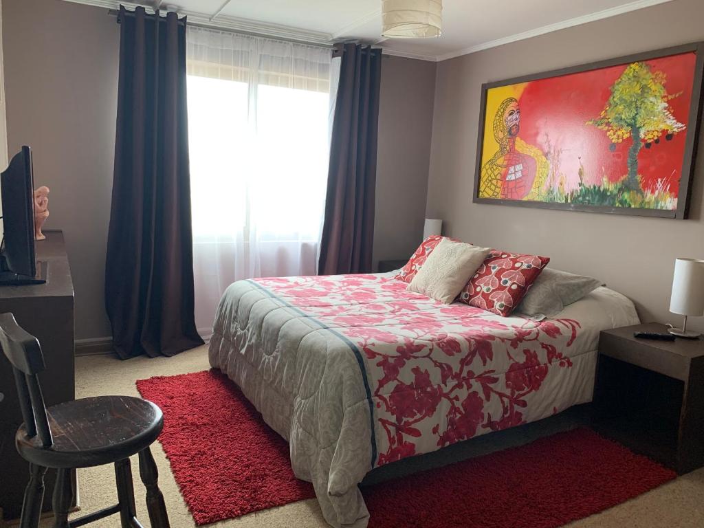 Postel nebo postele na pokoji v ubytování Hostal Boutique 180 Grados