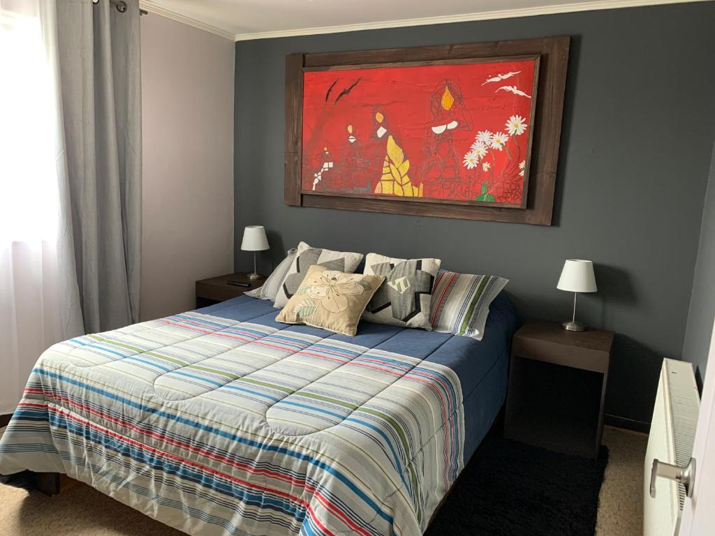 Postel nebo postele na pokoji v ubytování Hostal Boutique 180 Grados