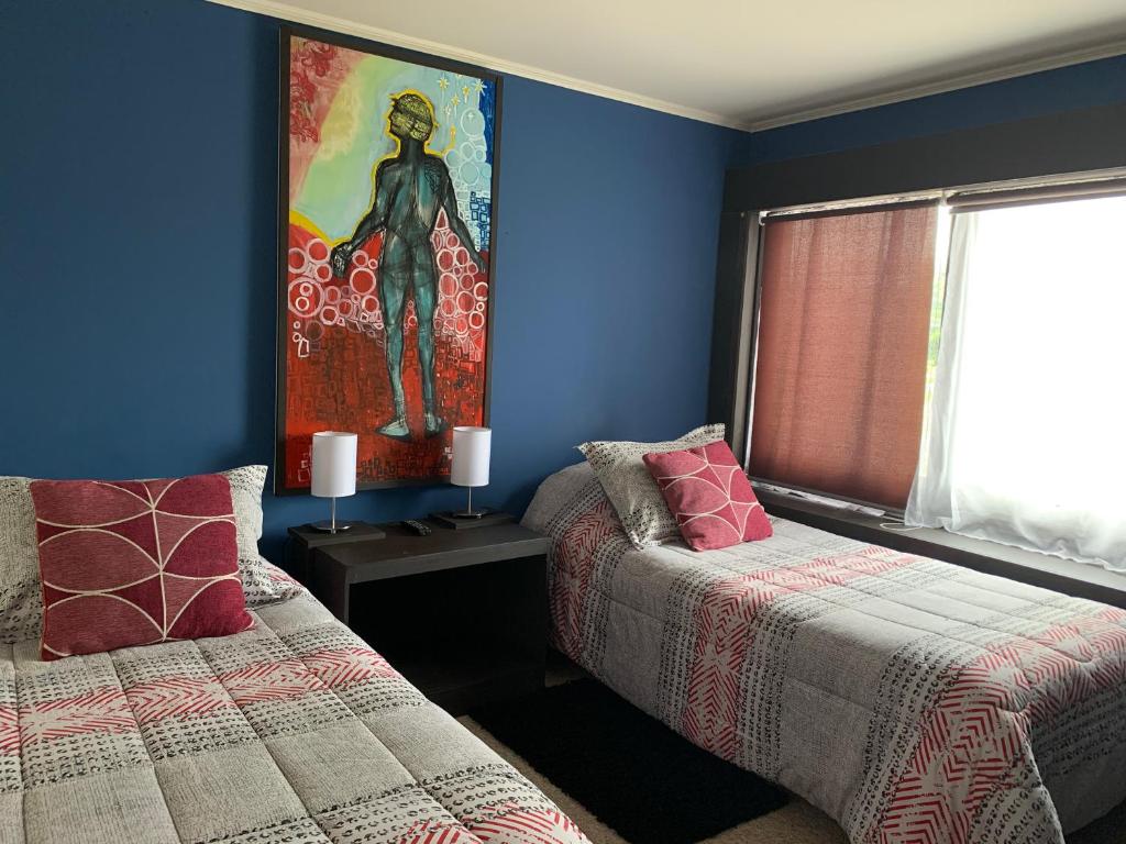 Postel nebo postele na pokoji v ubytování Hostal Boutique 180 Grados