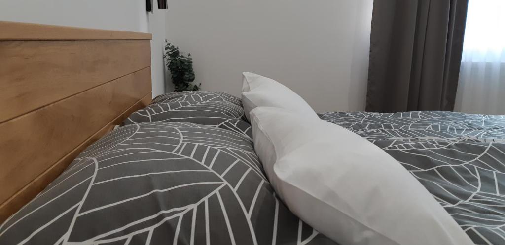 Postel nebo postele na pokoji v ubytování Apartments Woodnotes