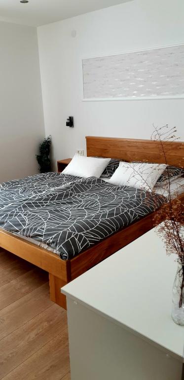 Postel nebo postele na pokoji v ubytování Apartments Woodnotes
