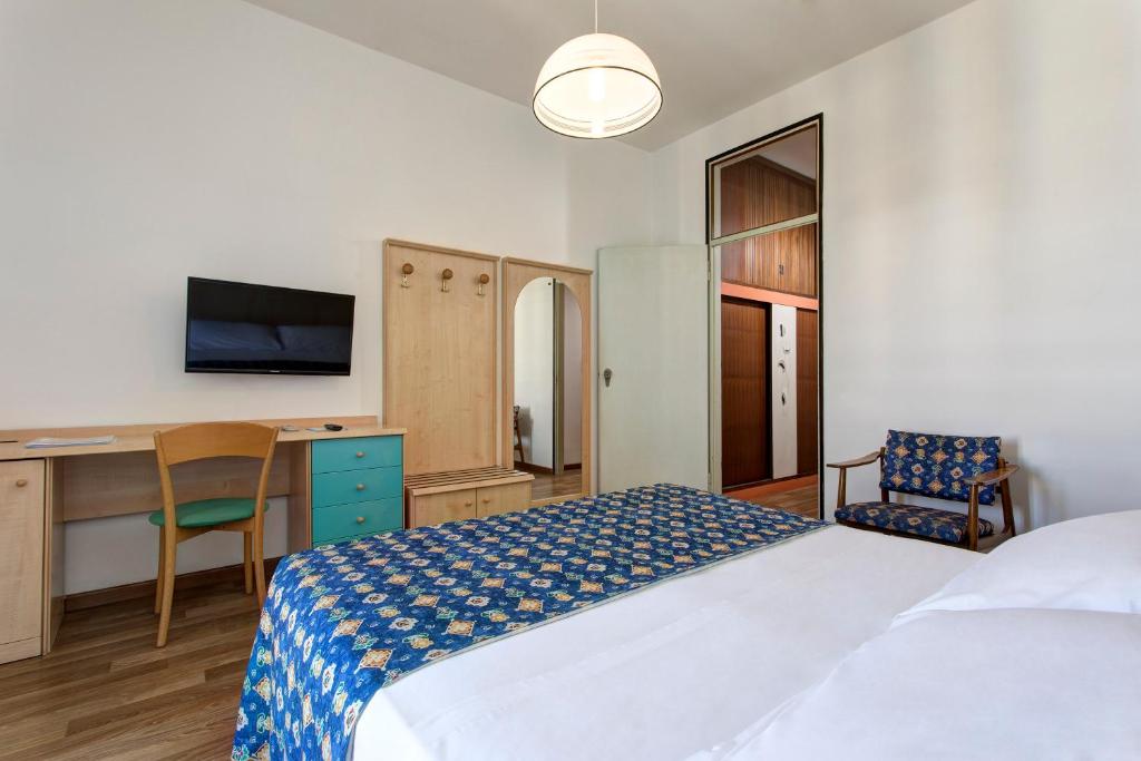 Postel nebo postele na pokoji v ubytování Hotel Las Vegas