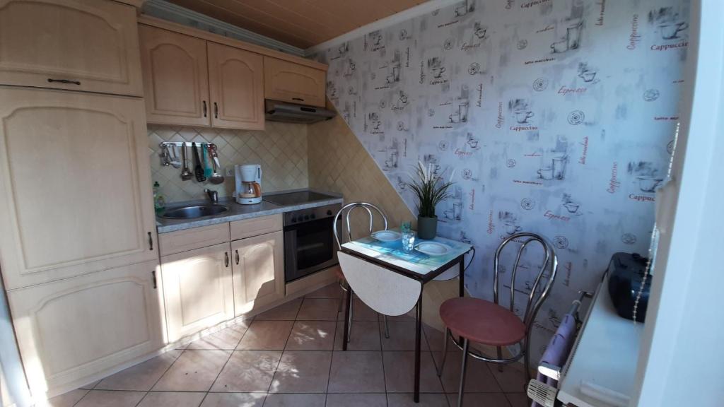 Kuchyň nebo kuchyňský kout v ubytování Landhaus Voß