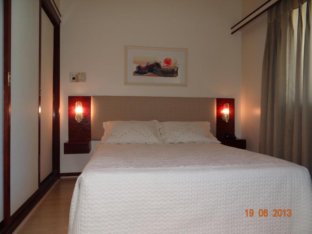 Cama o camas de una habitación en Le Premier Apartamentos