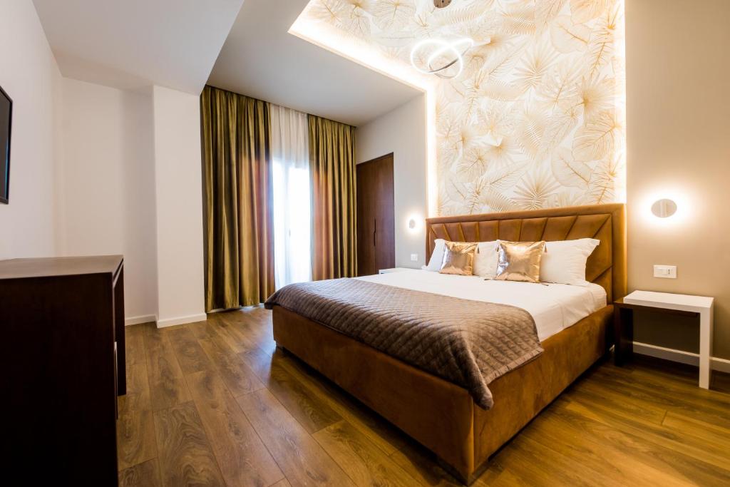 Postel nebo postele na pokoji v ubytování Hotel Bonsai
