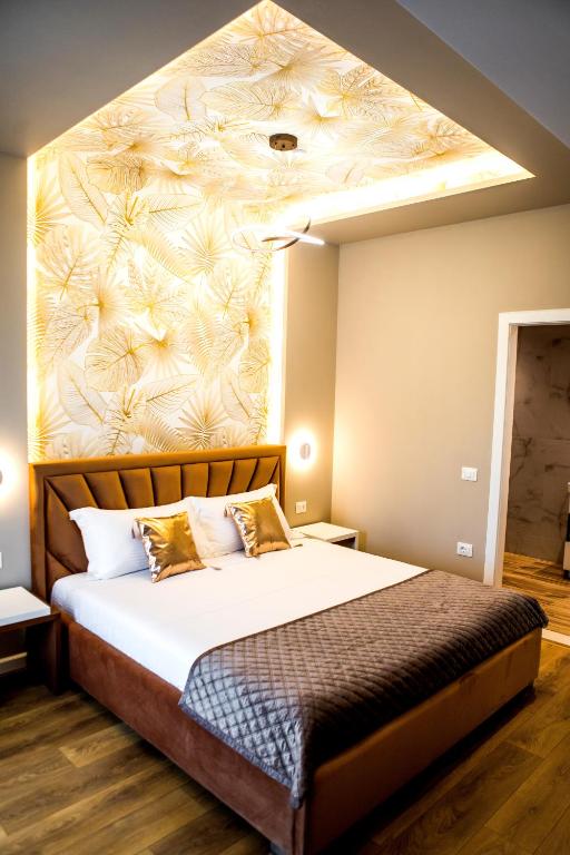 Postel nebo postele na pokoji v ubytování Hotel Bonsai