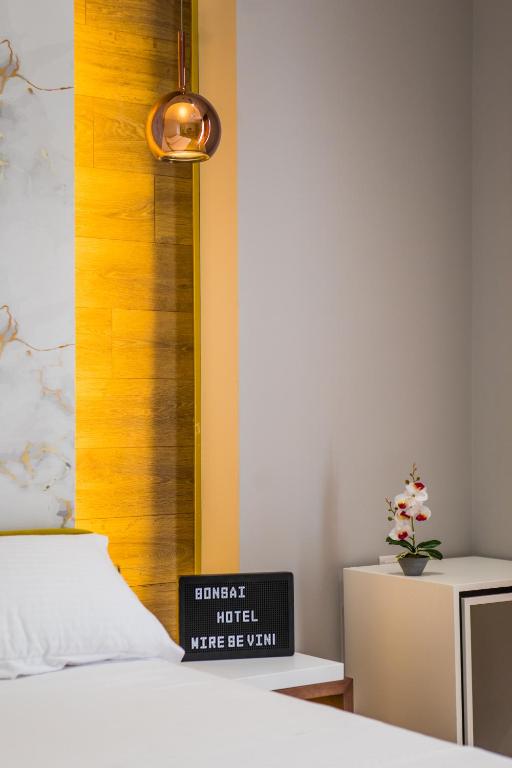 Postel nebo postele na pokoji v ubytování Hotel Bonsai
