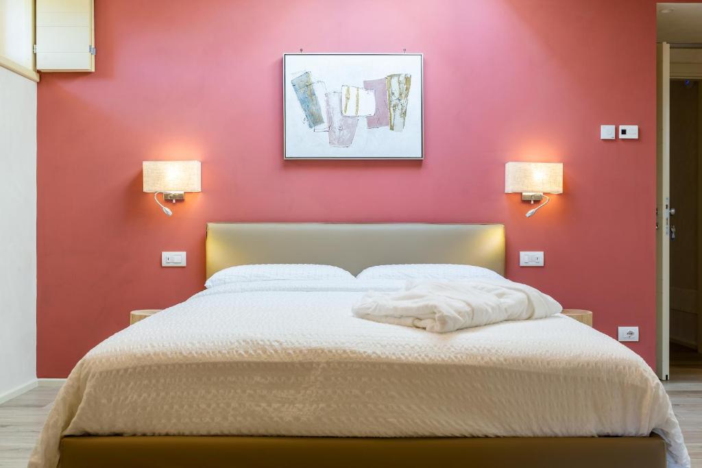 Postel nebo postele na pokoji v ubytování Borgo Cantagallo Casa Ofelia