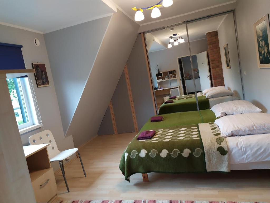 Postel nebo postele na pokoji v ubytování Ele kodumajutus