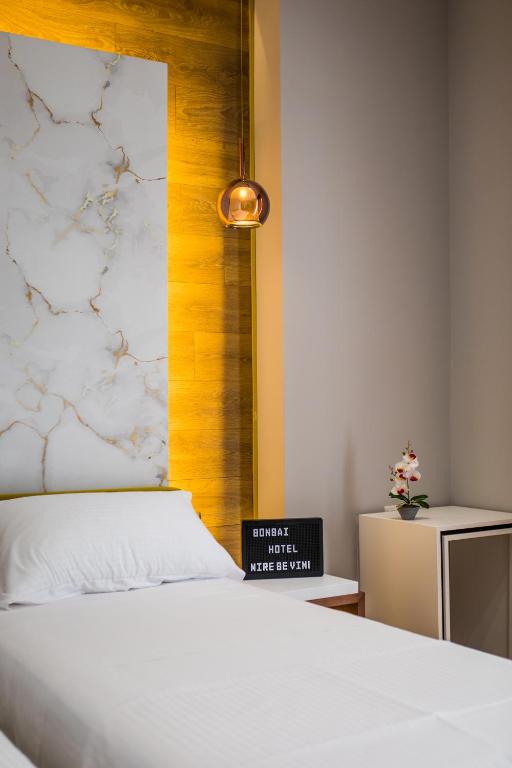 Postel nebo postele na pokoji v ubytování Hotel Bonsai