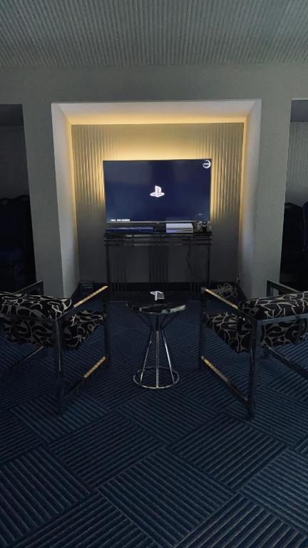 TV a/nebo společenská místnost v ubytování Hotel Konak