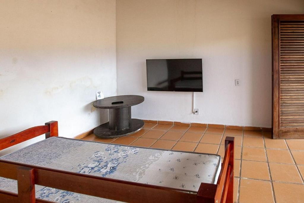  Casa grande 03 quartos com churrasqueira e internet