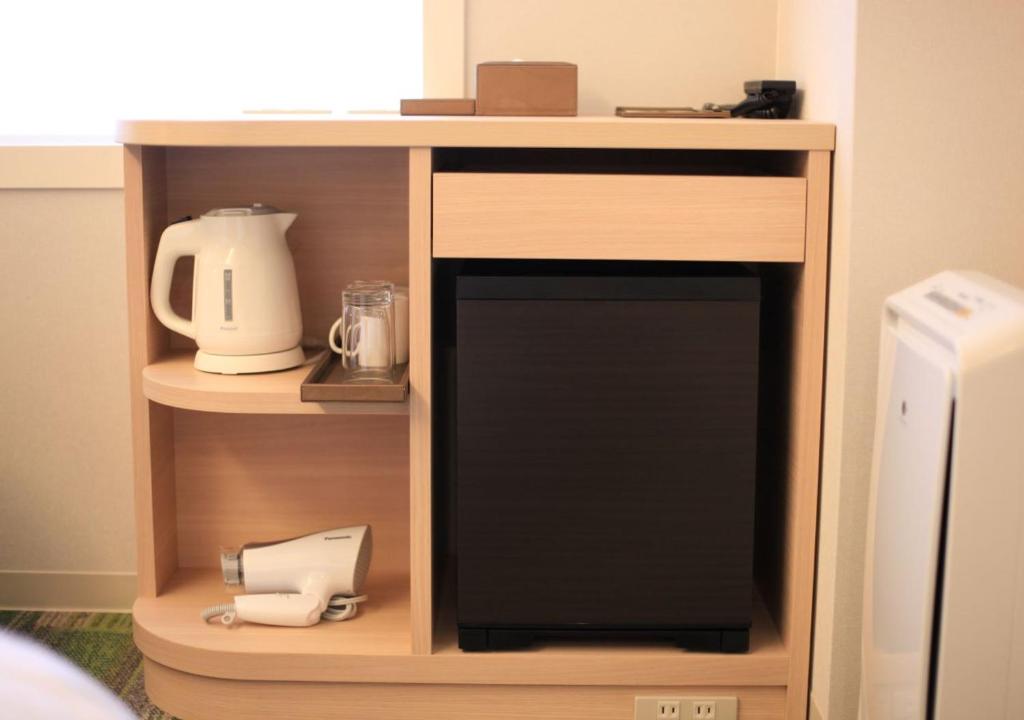 Kuchyň nebo kuchyňský kout v ubytování Urban Hotel Kyoto Gojo Premium